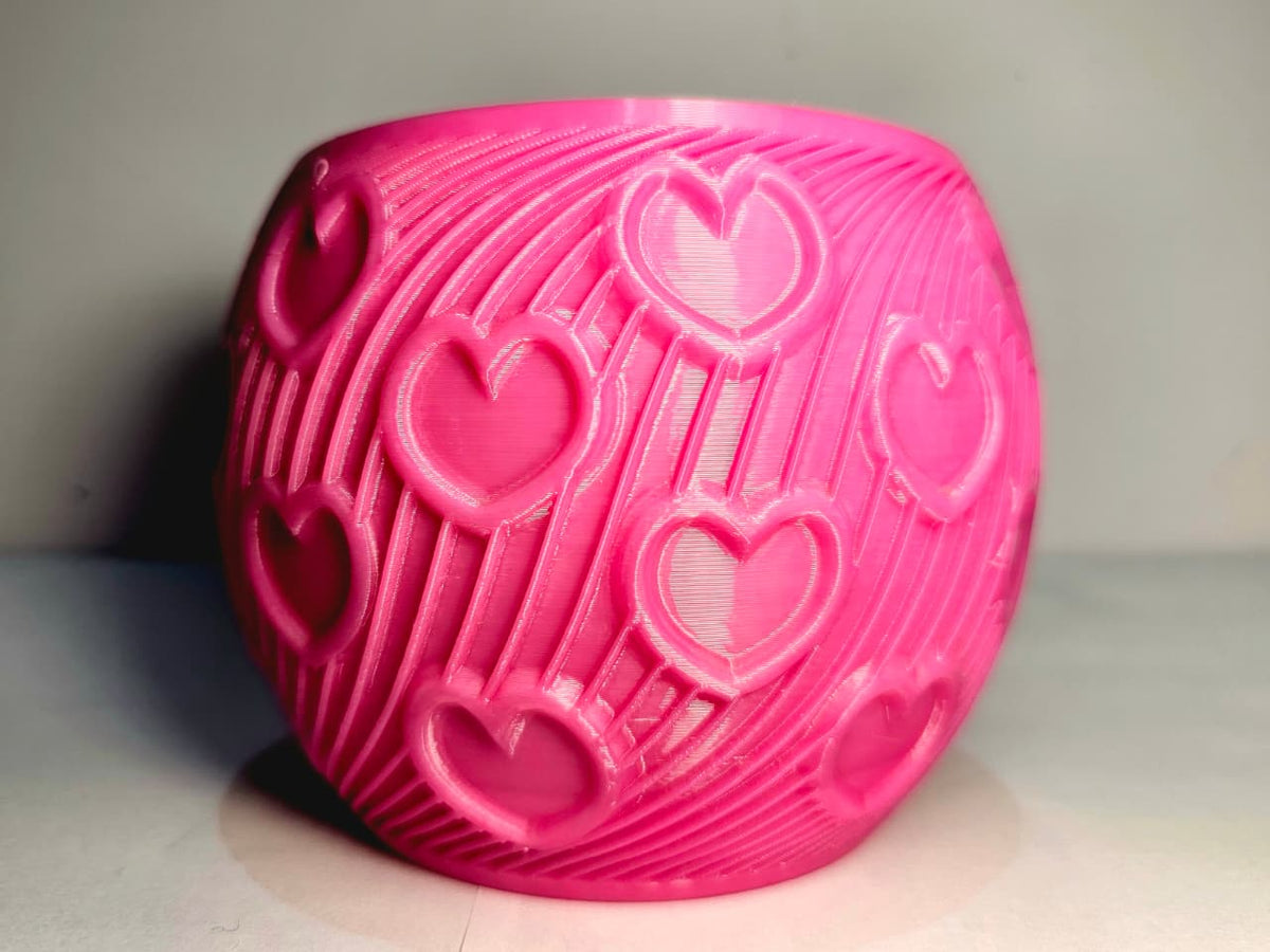 Maceta redonda con corazones